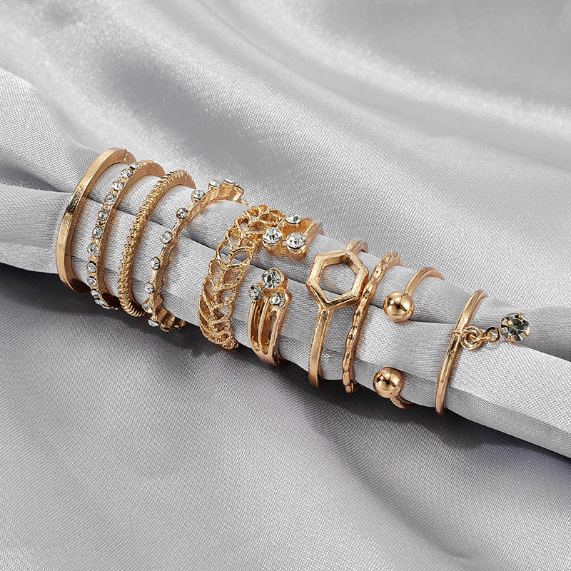 Luxury Gold Ring Set – 8-Piece Dainty & Boho Stacking Rings with Rhinestone Charms