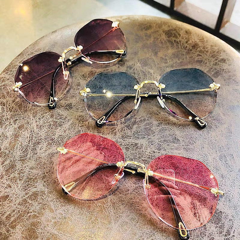 Chic Rimless Geometric Sunglasses – Elegant Gold Trim for Women